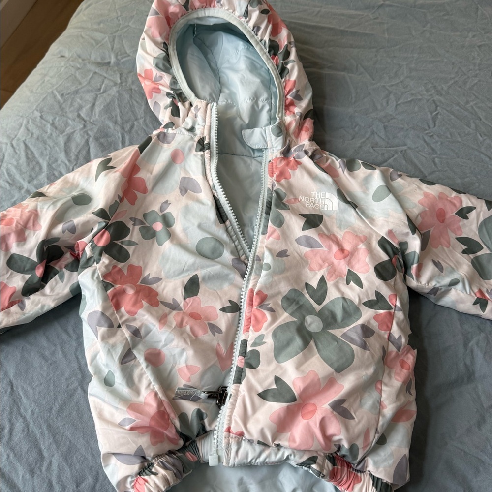 The North Face Pink and Floral/Light blue reversible  Baby Jacket